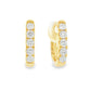 18K Yellow gold diamond set oval huggies. Item J38842 - ABC Jewelry Co.