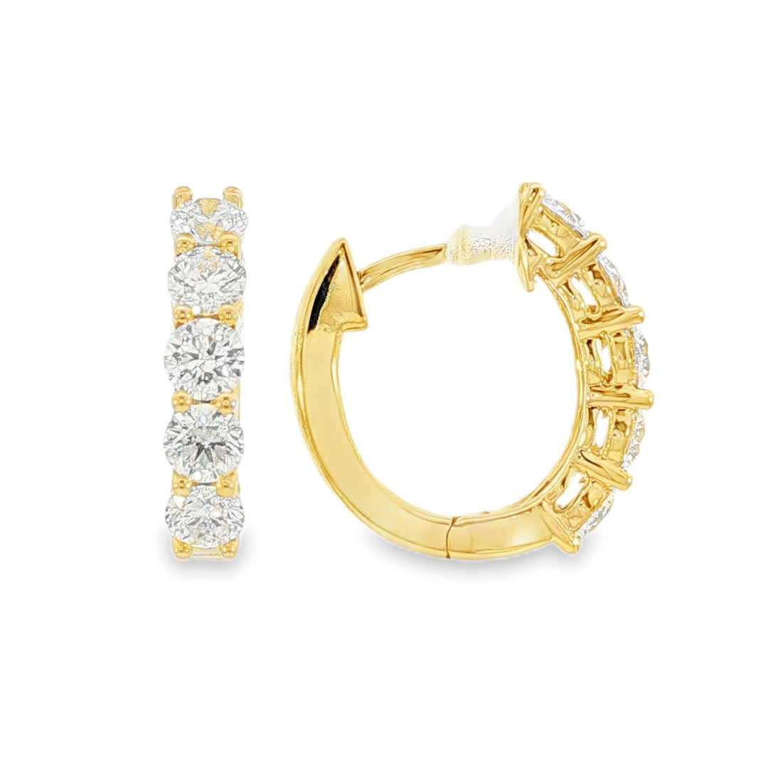 18K Yellow gold diamond set huggies. Item J38845 - ABC Jewelry Co.