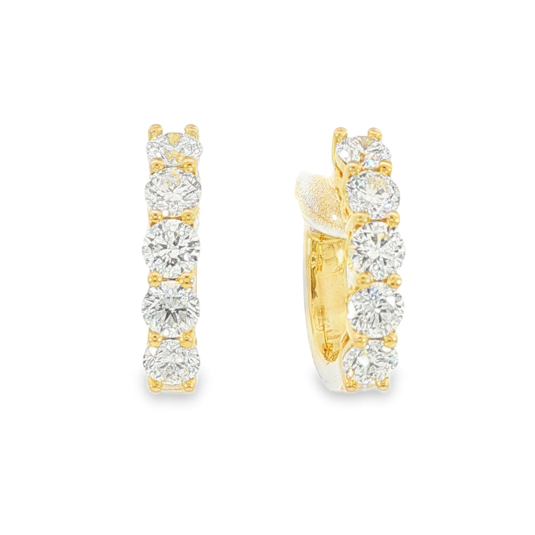 18K Yellow gold diamond set huggies. Item J38845 - ABC Jewelry Co.
