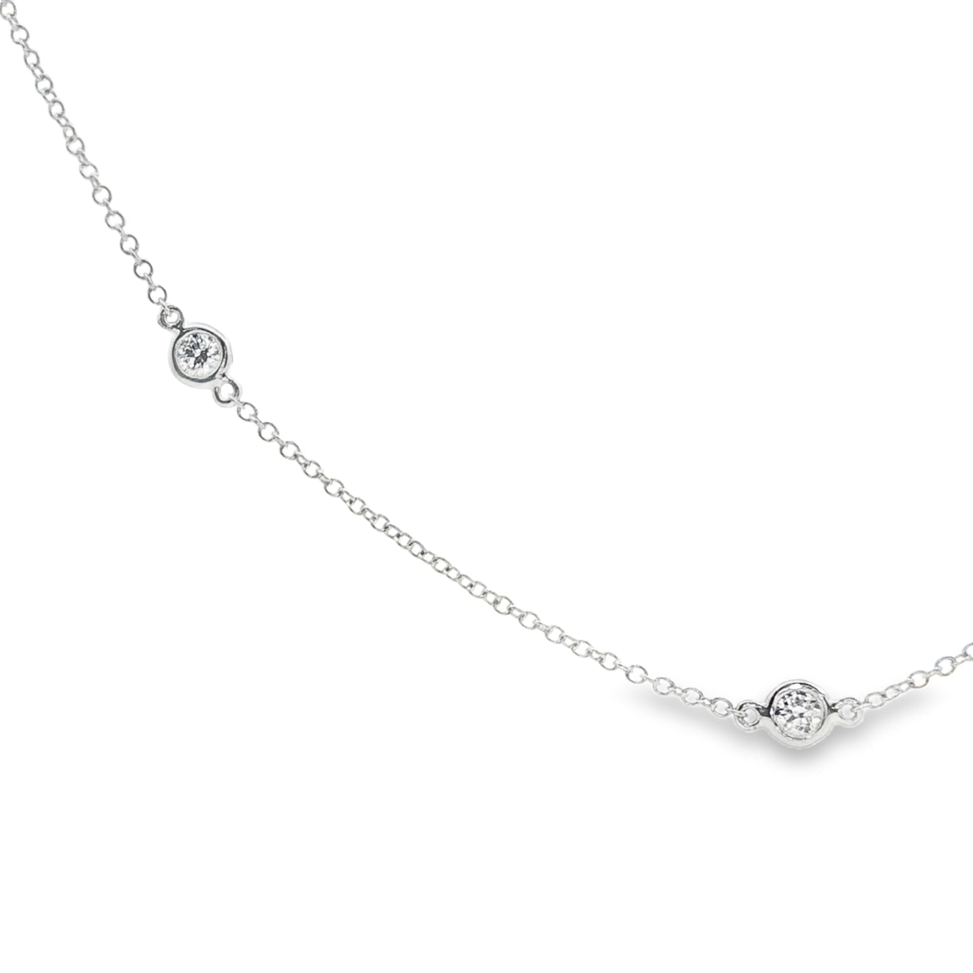 18K White gold necklace with bezel set diamonds bezel set along the chain. Item J38857 - ABC Jewelry Co. 