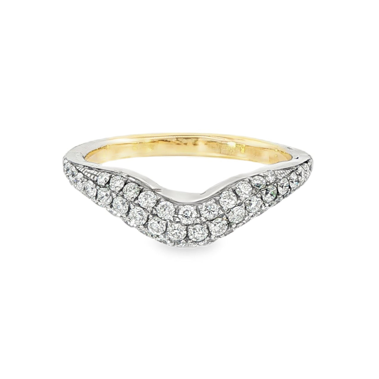 Curved band with 14K yellow gold shank and 18K white gold top pavé set with natural mined diamonds. Item J38913 - ABC Jewelry Co.