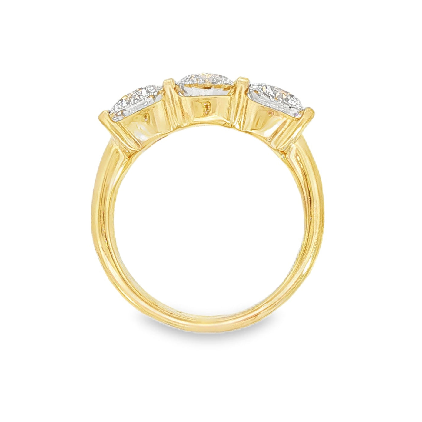 14K Yellow gold ring set with 3 round brilliant diamonds. Item J38945 - ABC Jewelry Co. 