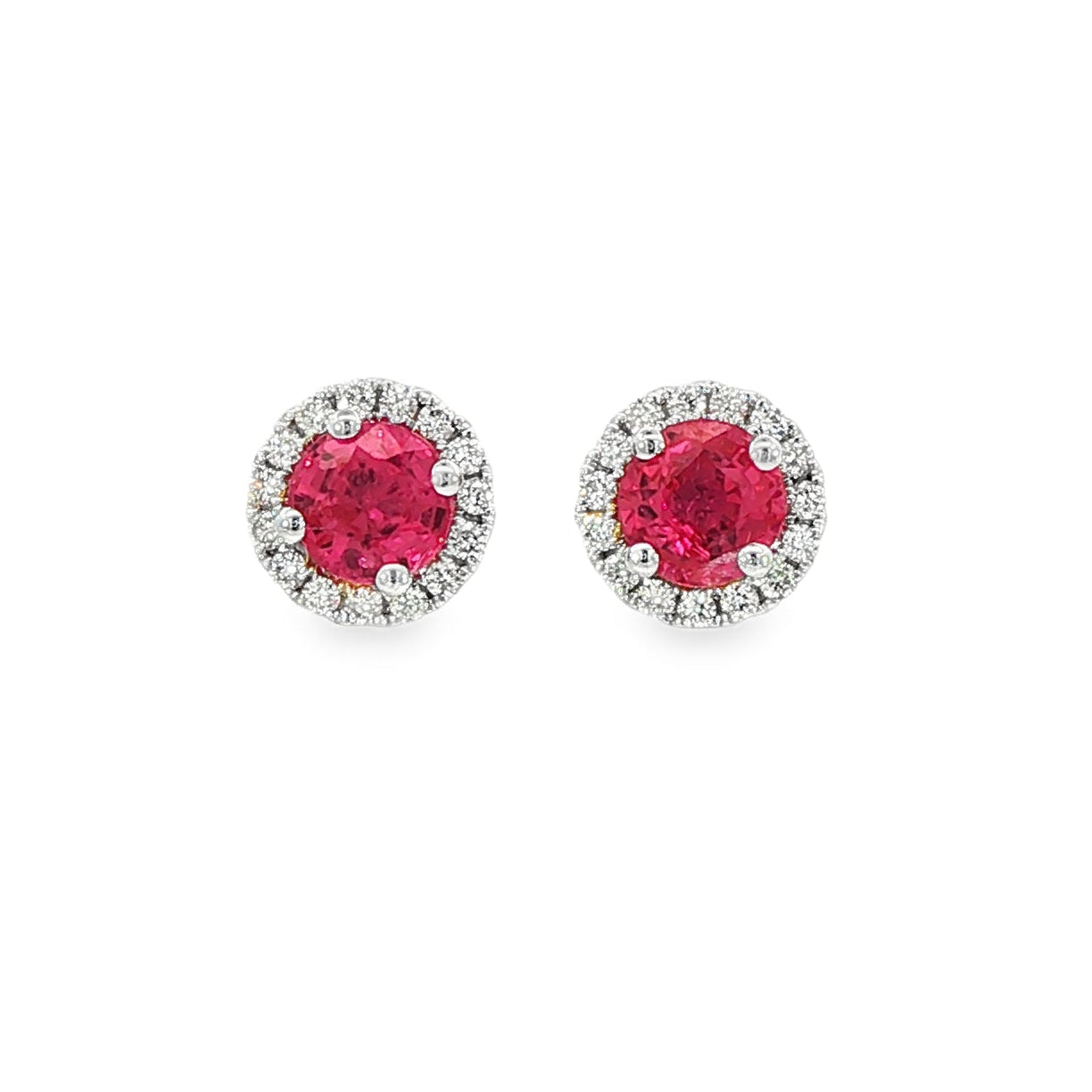 14K White gold earrings set with round rubies surrounded by a diamond halo. Item J38962 - ABC Jewelry Co. 