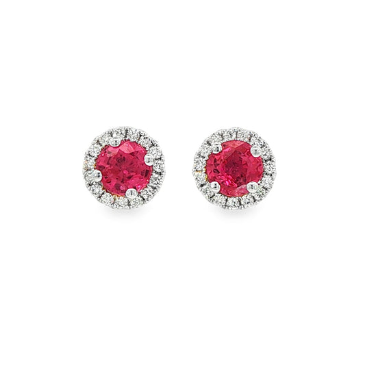 14K White gold earrings set with round rubies surrounded by a diamond halo. Item J38962 - ABC Jewelry Co. 