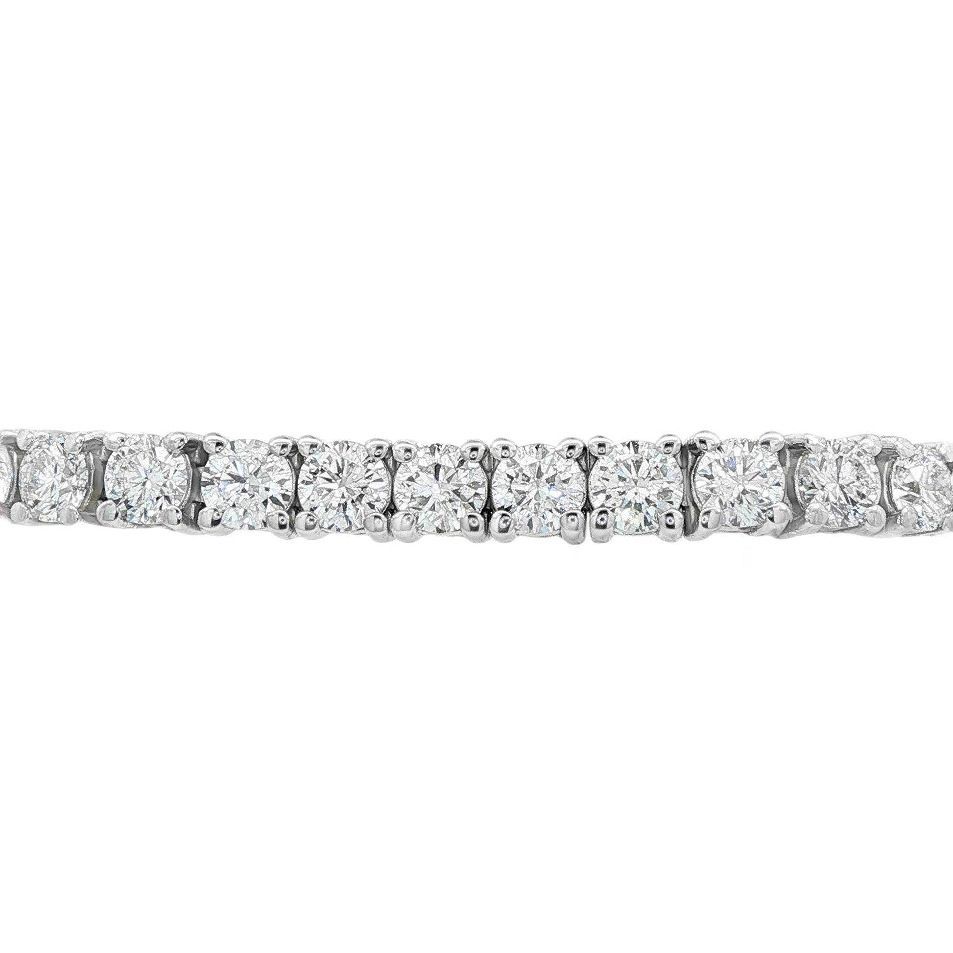 14K White gold tennis bracelet set with round brilliant diamonds. Item J38985 - ABC Jewelry Co