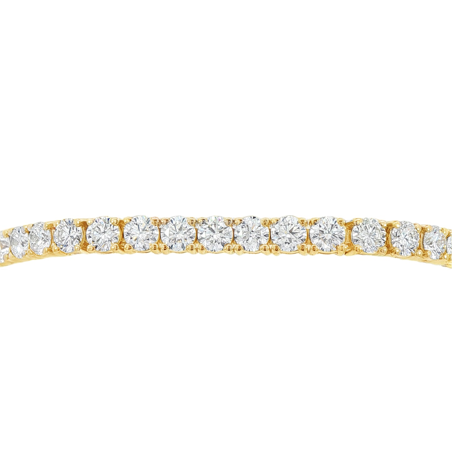14K Yellow gold tennis bracelet set with round brilliant diamonds. Item J38986 - ABC Jewelry Co. 