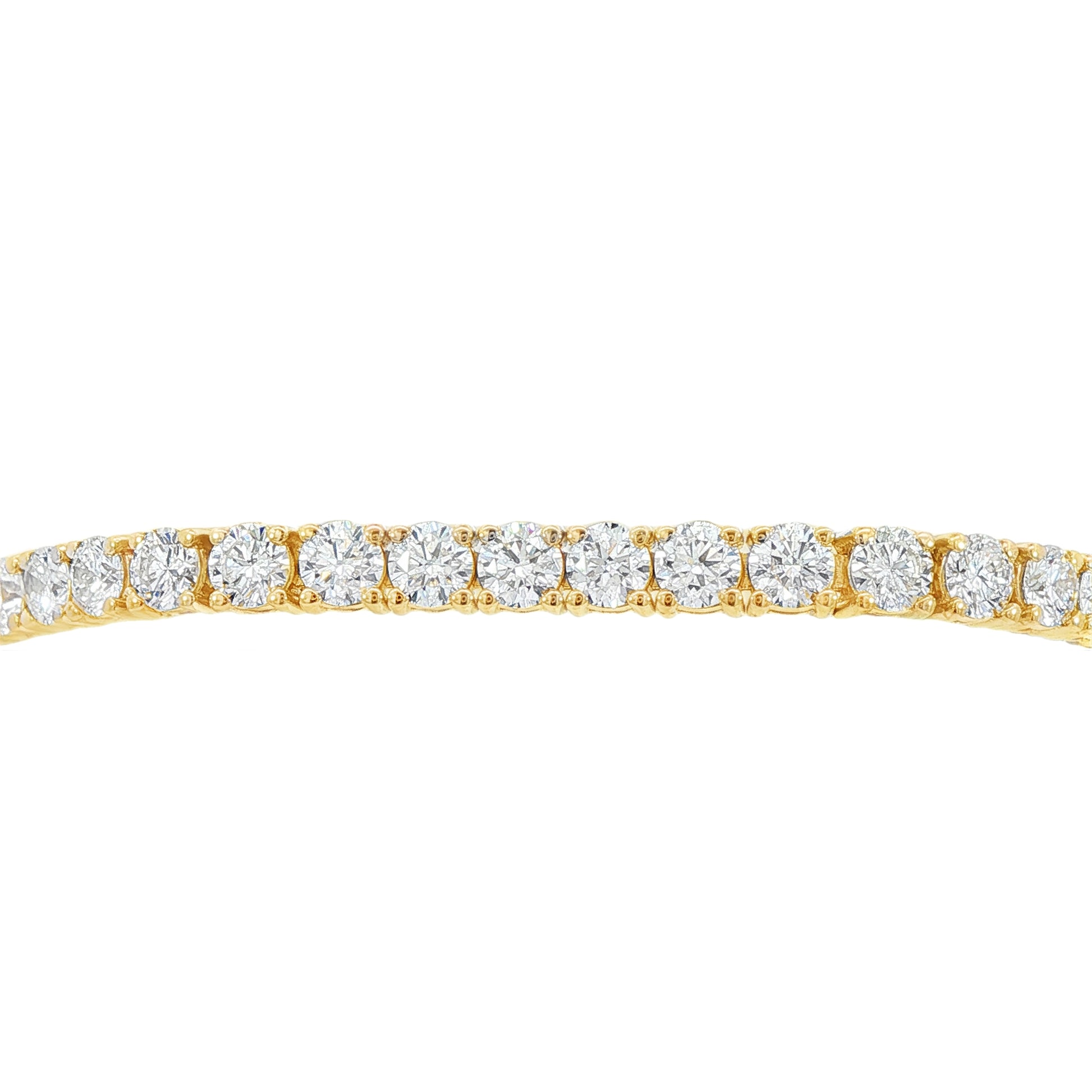 14K Yellow gold tennis bracelet set with round brilliant diamonds. Item J38986 - ABC Jewelry Co. 