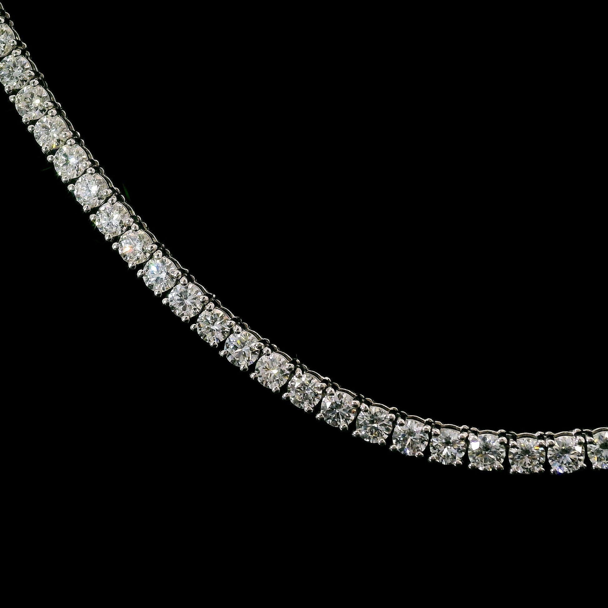 14K White gold tennis necklace set with round brilliant diamonds. Item J39048 - ABC Jewelry