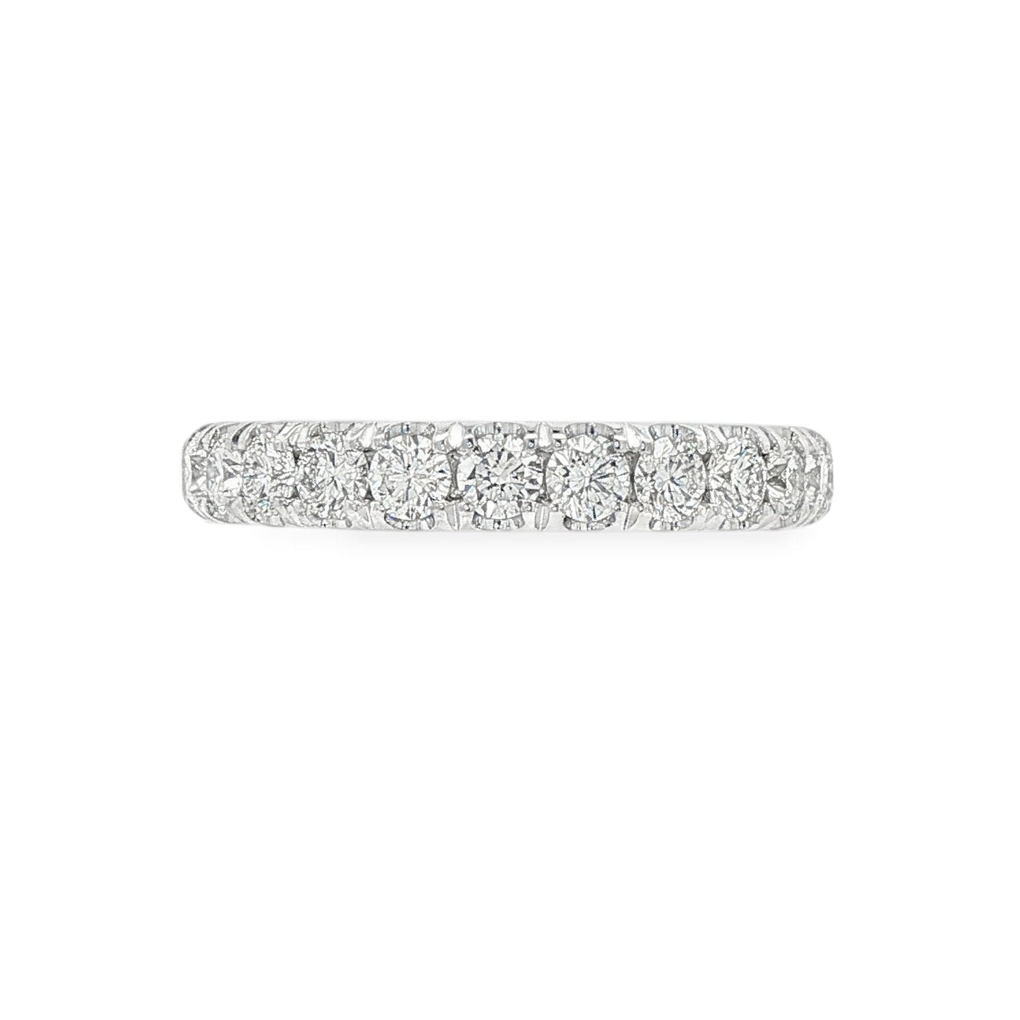 14K White gold band set with round brilliant diamonds. Item J39099 - ABC Jewelry Co.