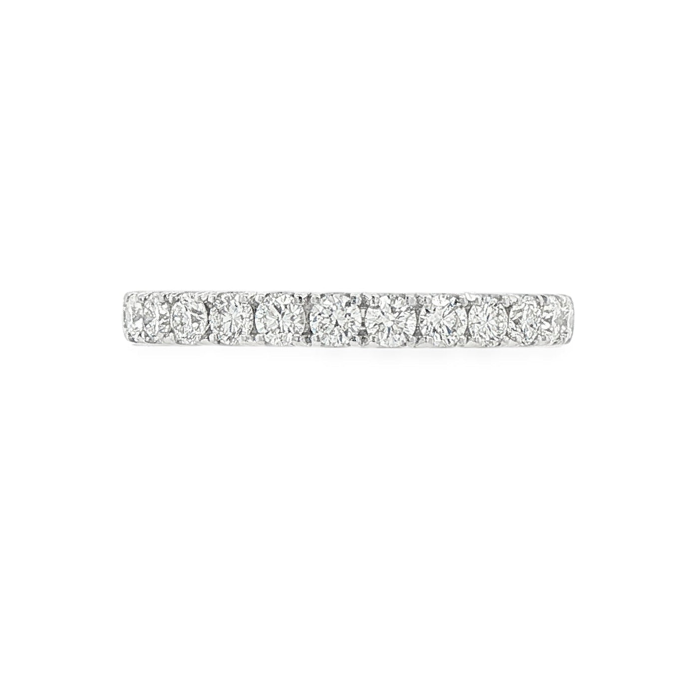 14K White gold band set with round brilliant diamonds. Item J39115 - ABC Jewelry Co.
