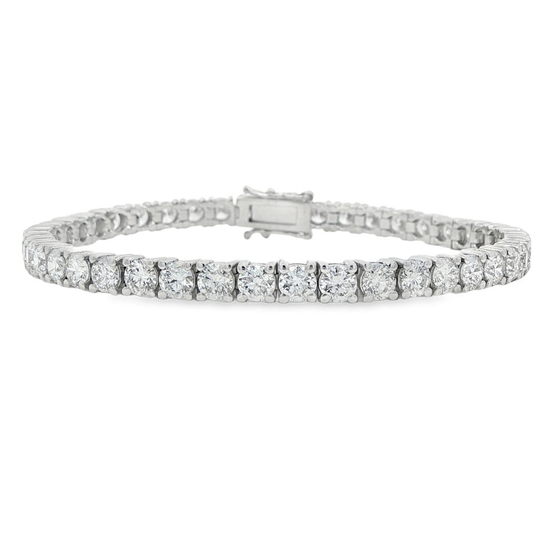 14K White gold tennis bracelet set with round brilliant diamonds. Item J38985 - ABC Jewelry Co