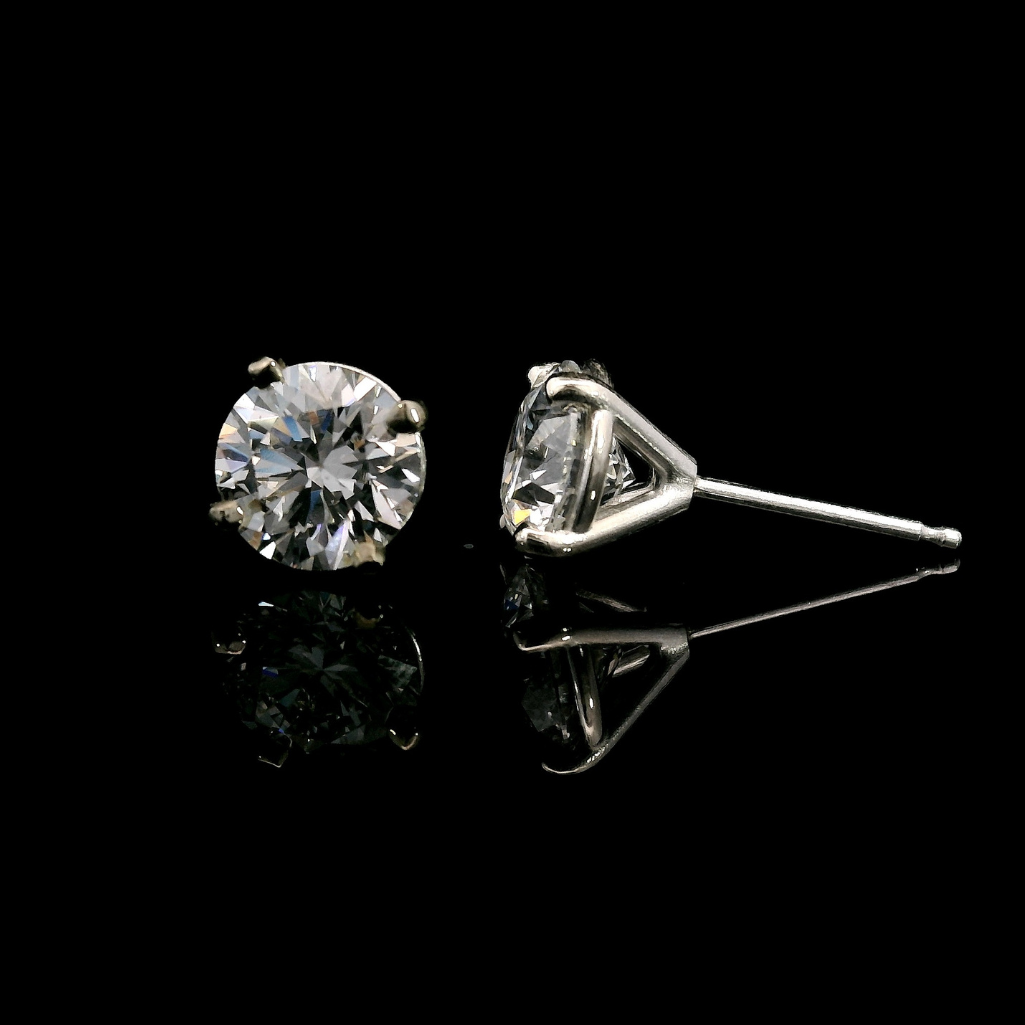 14K White gold studs set with round brilliant diamonds. Item J38143 - ABC Jewelry Co. 