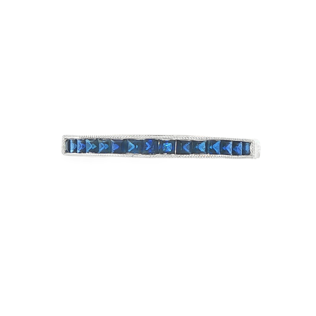 14K White gold band channel set with blue sapphires. Item J32315 - ABC Jewelry Co. 