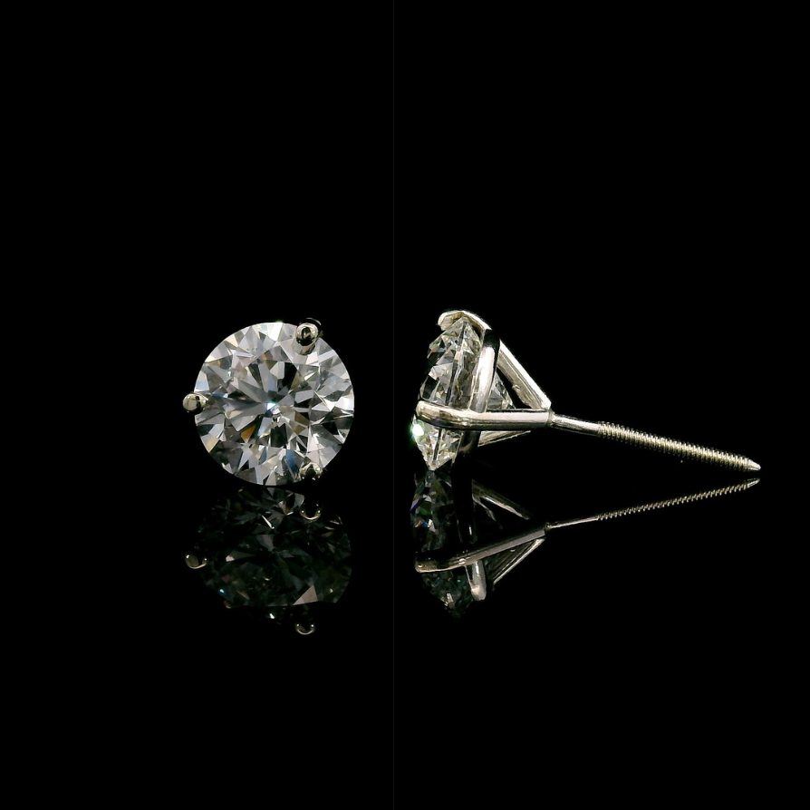 14K White gold studs set with round brilliant diamonds. Item J37908 - ABC Jewelry Co. 