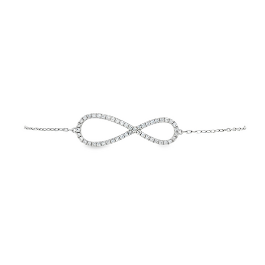 18K White gold delicate chain bracelet with diamond set infinity symbol. Item J33121 - ABC Jewelry Co