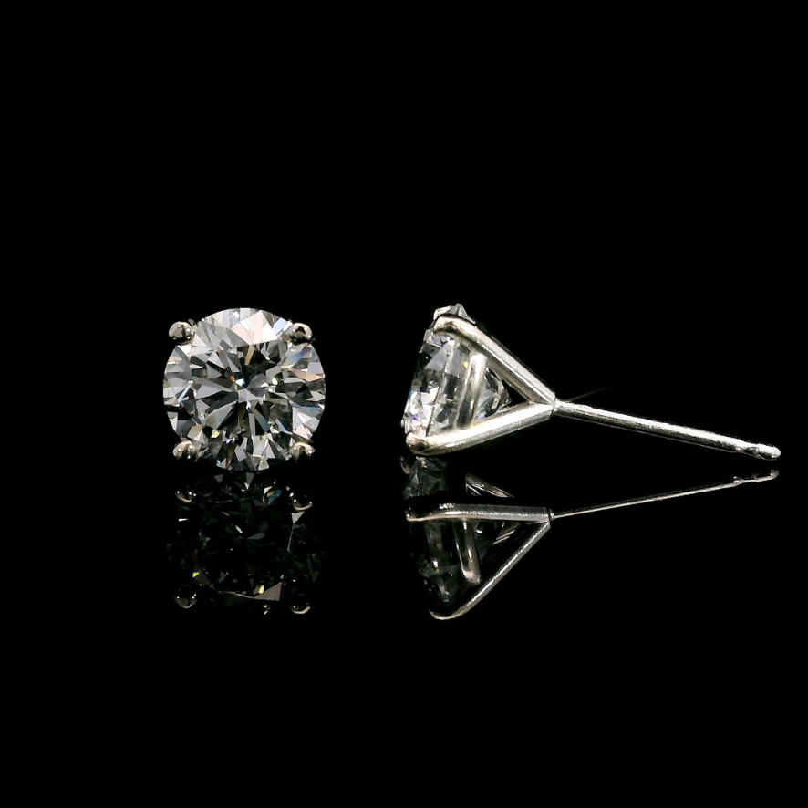 14K White gold studs set with round brilliant diamonds. Item J37952 - ABC Jewelry Co. 