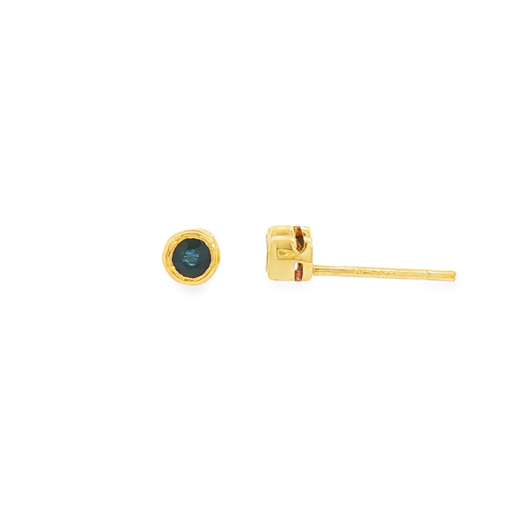 14K Yellow gold bezel set blue sapphire stud earrings. Item 3595 - ABC Jewelry Co. 