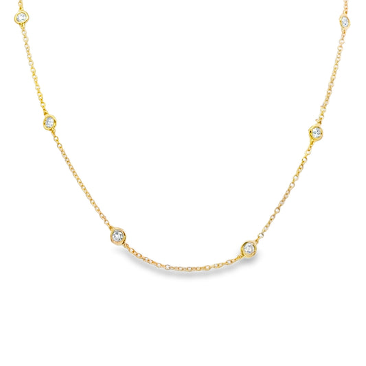 18K Yellow gold necklace with bezel set round brilliant diamonds set along the chain. Item J38856 - ABC Jewelry Co. 