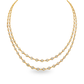 A double-strand gold necklace featuring small round diamonds set along the chain, displayed set on a white background.