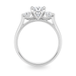 White gold three stone ring with round brilliant diamonds. Set on plain white background. 