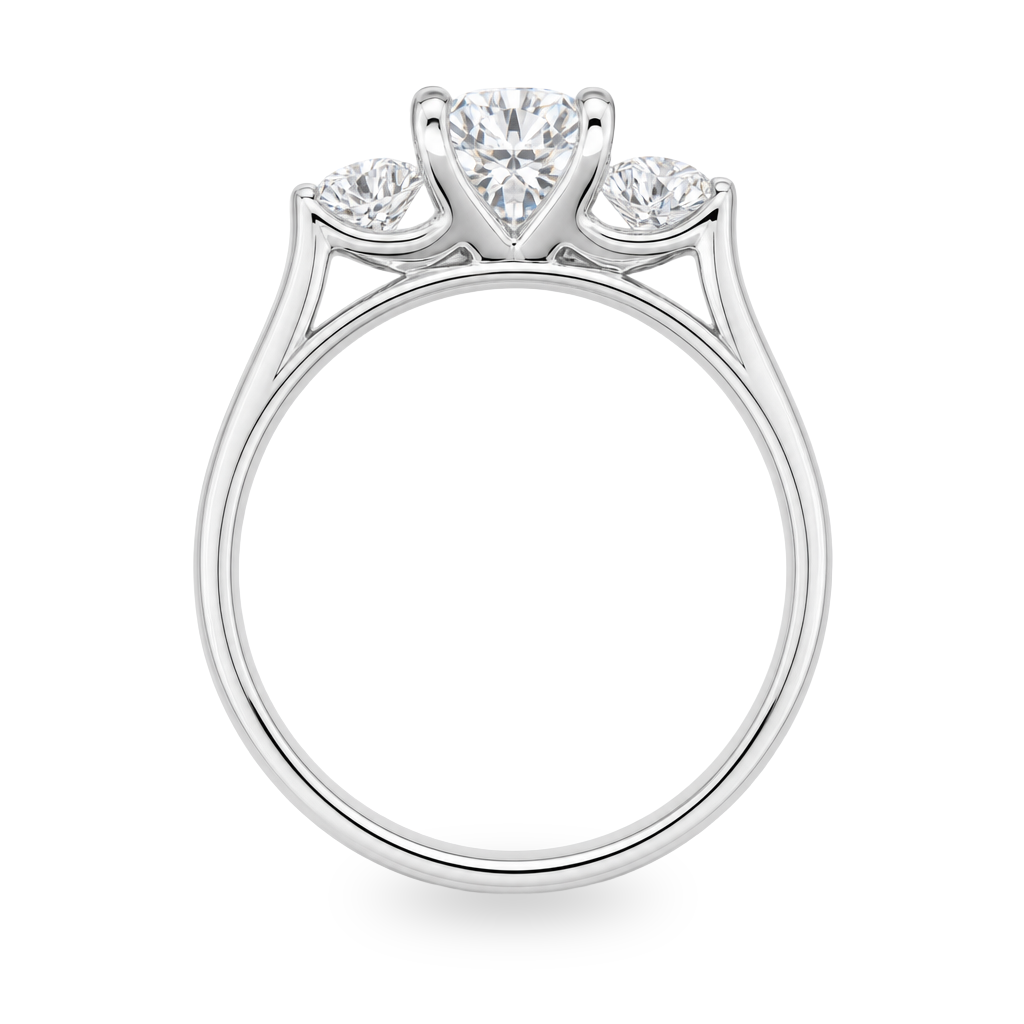 White gold three stone ring with round brilliant diamonds. Set on plain white background. 