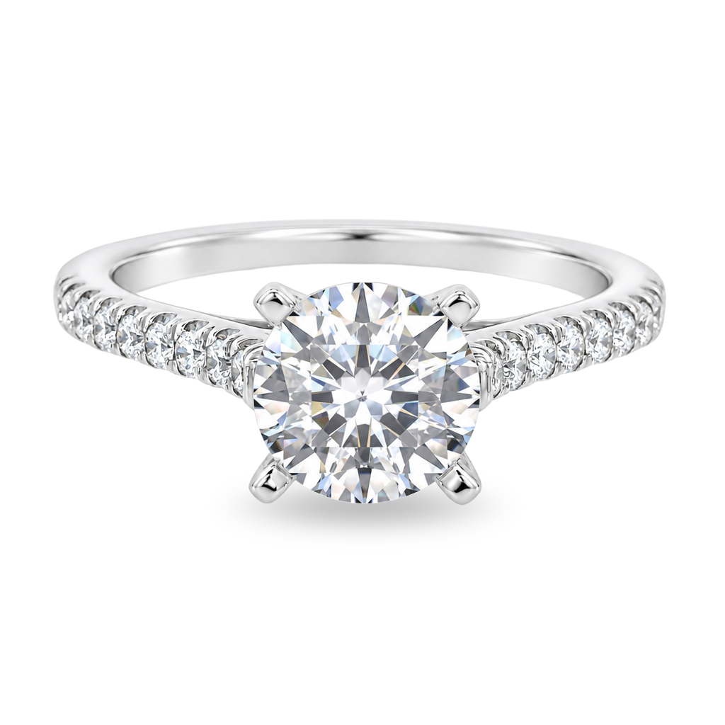 White gold ring with diamonds set along the band, center set with round diamond. Shown on a clean white background.