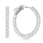 A pair of white gold hoop earrings set with round-cut clear gemstones, shown from two angles on a plain white background.