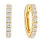 A pair of gold huggie hoop earrings set with round-cut clear gemstones, shown from the front and side on a plain white background.