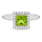 White gold ring set with cushion cut peridot with square diamond halo. Set on clean white background