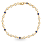 A gold link bracelet featuring alternating round bezel-set diamonds and deep blue sapphires, with a lobster clasp closure, shown on a plain white background.