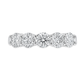 White gold band with 5 round brilliant diamonds in a shared prong setting 