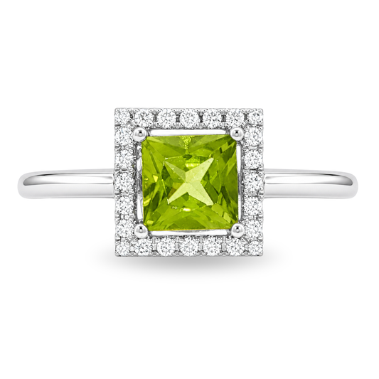 White gold ring set with cushion cut peridot with square diamond halo. Set on clean white background