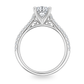 White gold ring with diamonds set along the band, center set with round diamond. Shown on a clean white background.