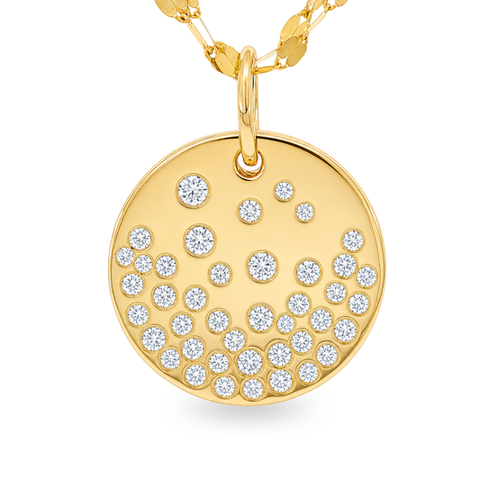 A round yellow gold pendant necklace featuring a pavé-set arrangement of small clear round-cut gemstones, suspended from a matching gold chain against a clean white background.