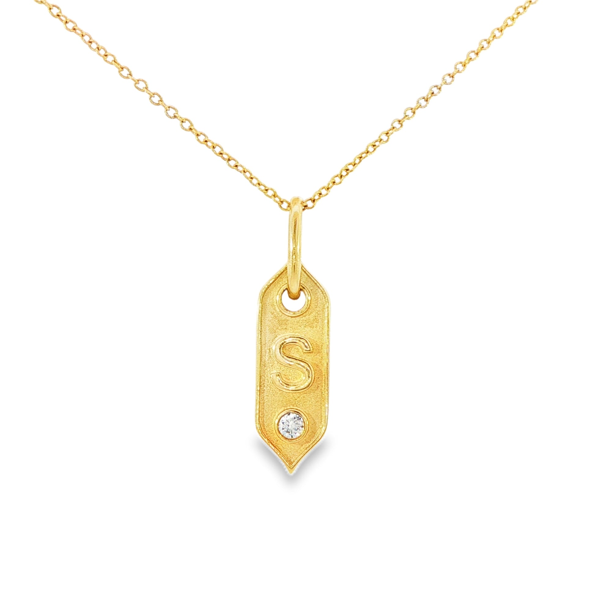 14K Yellow gold pendant necklace with initial "S" and one round brilliant diamond. Item J35419 - ABC Jewelry Co.
