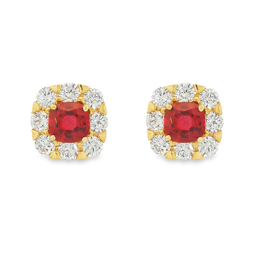 18K Yellow gold earrings set with round red rubies surrounded by a halo of round brilliant diamonds. Item J35757 - ABC Jewelry Co.