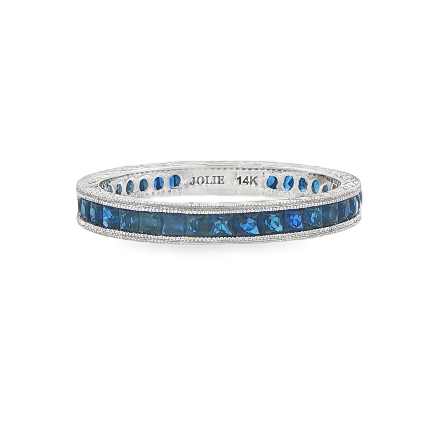 14K White gold eternity band set with princess cut blue sapphires. Item J37260 - ABC Jewelry Co. 