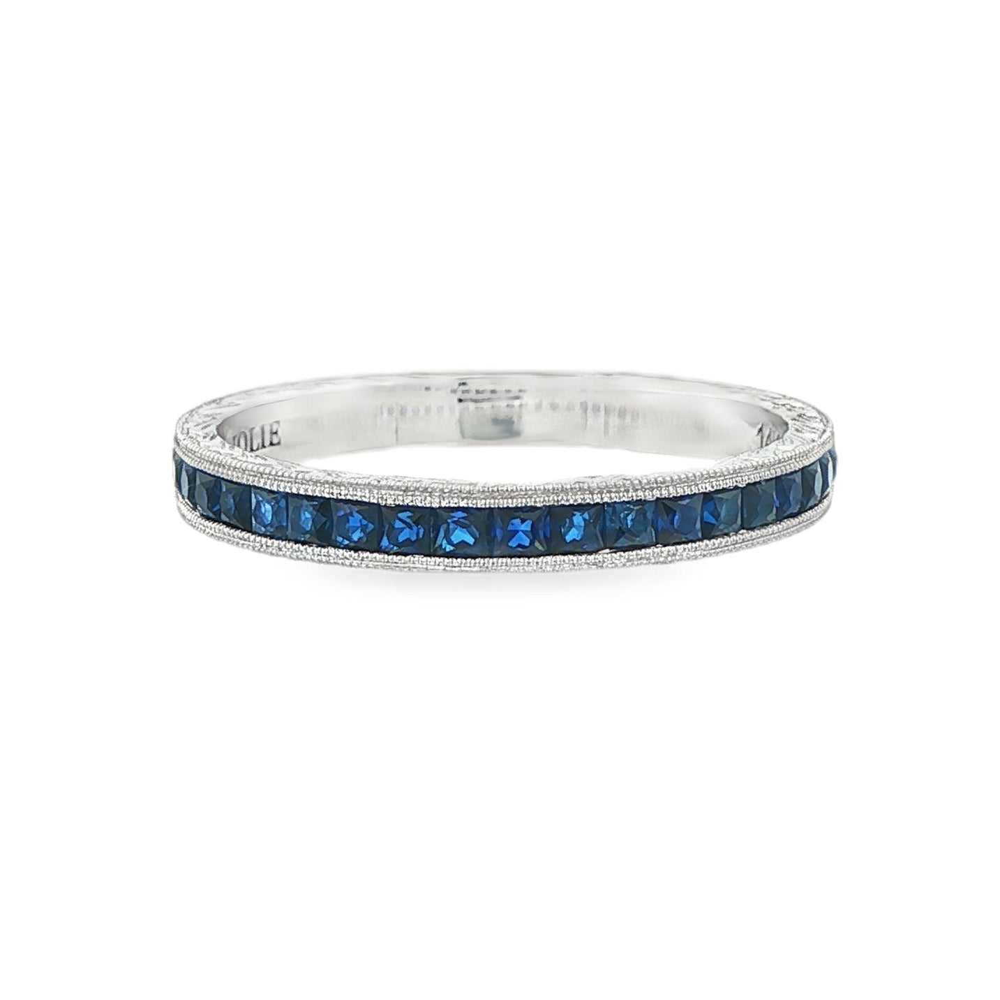 14K White gold band channel set with princess cut blue diamonds. Item 17614 - ABC Jewelry Co.