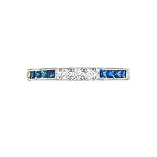 18K White gold eternity band set with princess set blue sapphires and round brilliant diamonds. Item J37387 - ABC Jewelry Co. 
