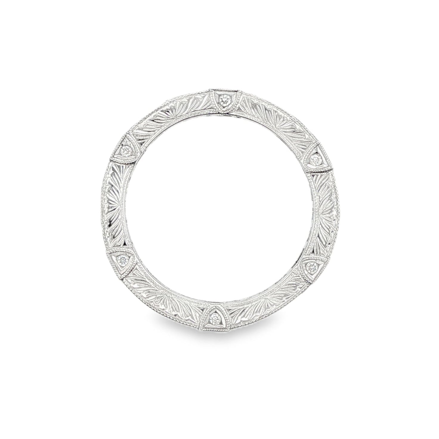 14K White gold eternity band set with princess cut blue sapphires and baguette diamonds. Item J37388 - ABC Jewelry Co. 