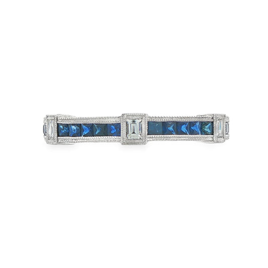 14K White gold eternity band set with princess cut blue sapphires and baguette diamonds. Item J37388 - ABC Jewelry Co. 