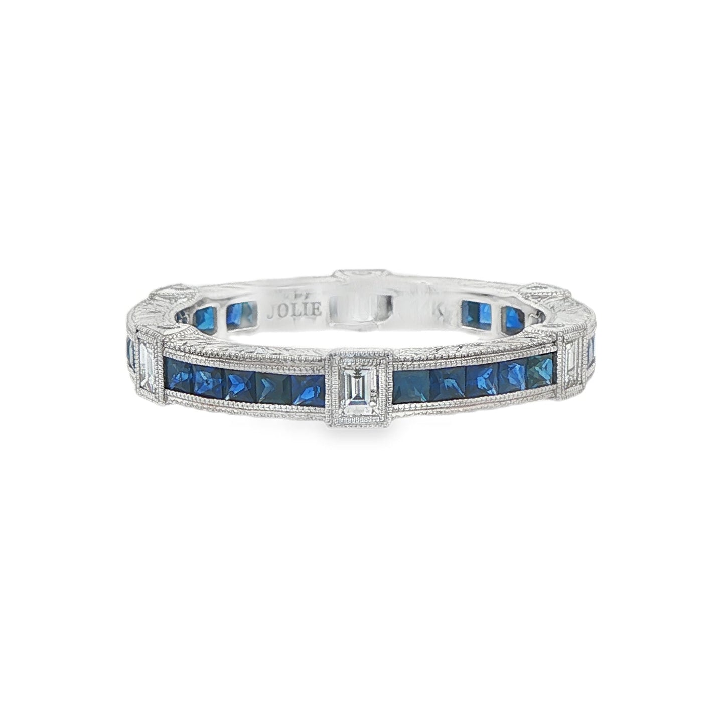 14K White gold eternity band set with princess cut blue sapphires and baguette diamonds. Item J37388 - ABC Jewelry Co. 