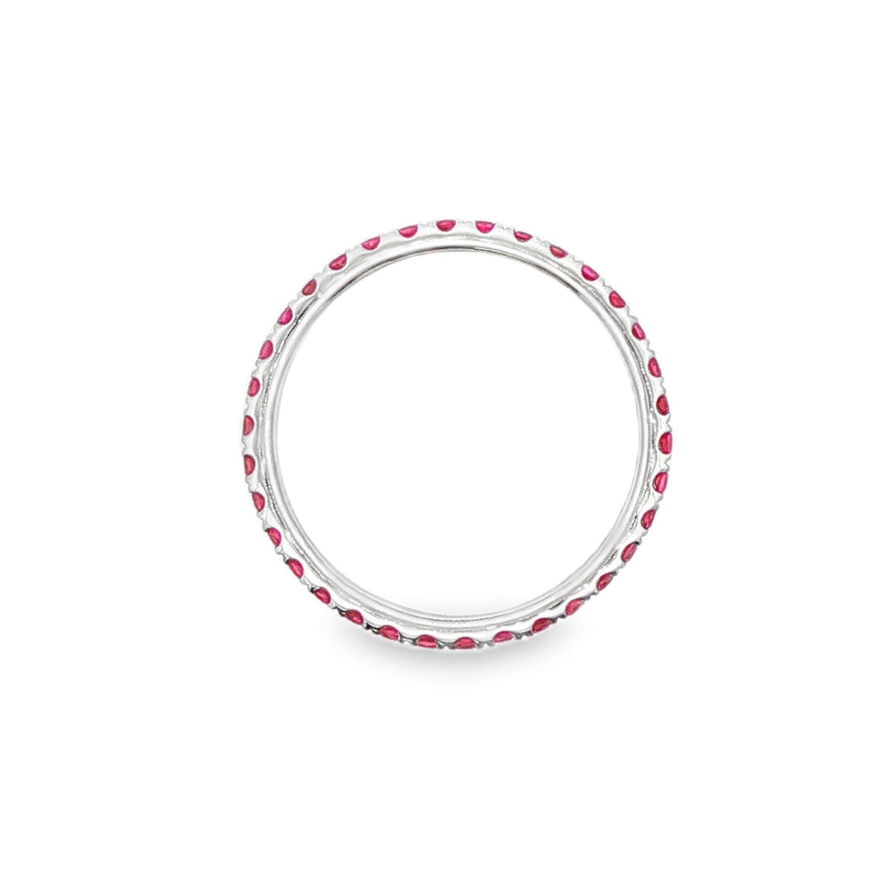 18K White gold eternity band set with brilliant cut rubies. Item J37475 - ABC Jewelry Co. 