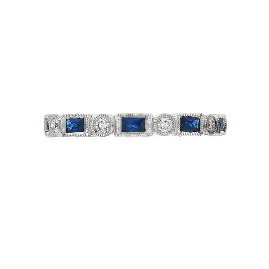 18K White gold eternity band set with blue sapphires and diamonds. Item J37559 - ABC Jewelry Co.