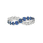 18K White gold cross-over ring set with blue sapphires and round brilliant diamonds. Item J37605 - ABC Jewelry Co. 