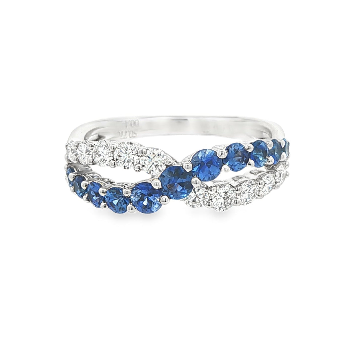 18K White gold cross-over ring set with blue sapphires and round brilliant diamonds. Item J37605 - ABC Jewelry Co. 