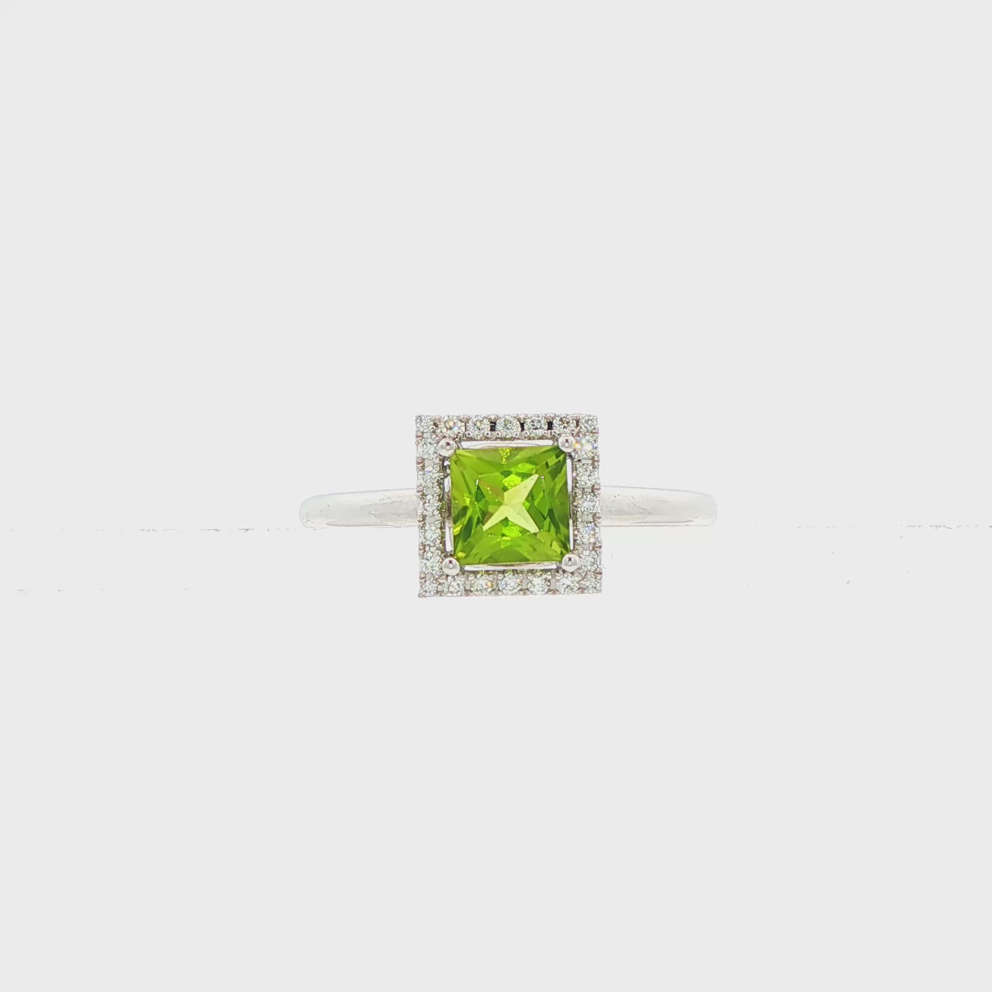 14K White gold ring featuring a square cut peridot with a diamond halo. Item J38754 - ABC Jewelry Co. 