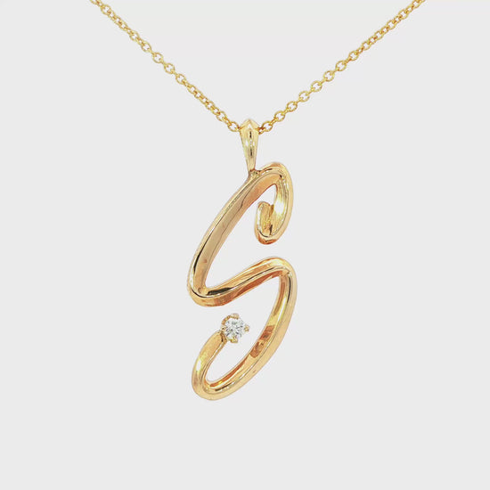 14K Yellow gold initial "S" pendant set with one round brilliant diamond. Item J37145 - ABC Jewelry Co. 