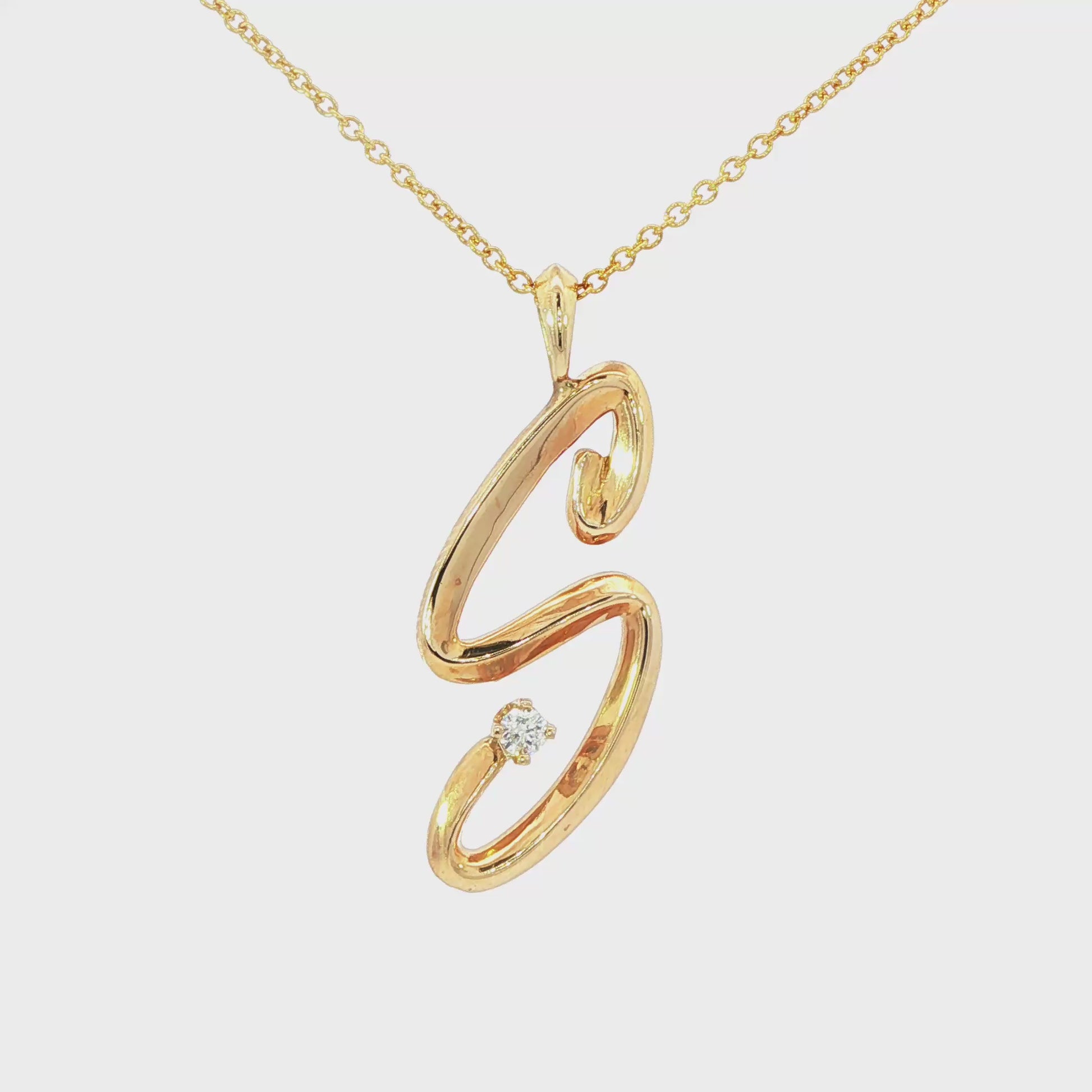 14K Yellow gold initial "S" pendant set with one round brilliant diamond. Item J37145 - ABC Jewelry Co. 
