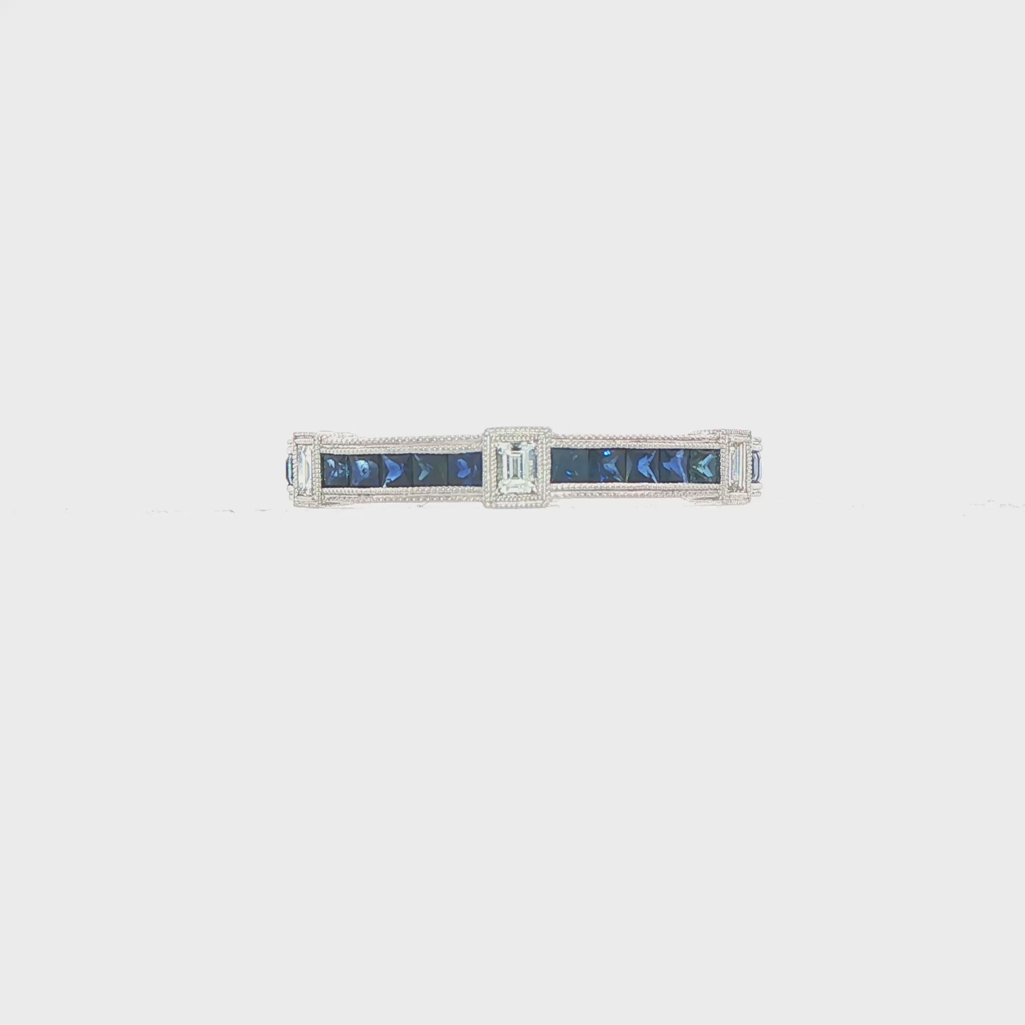 14K White gold eternity band set with princess cut blue sapphires and baguette diamonds. Item J37388 - ABC Jewelry Co. 